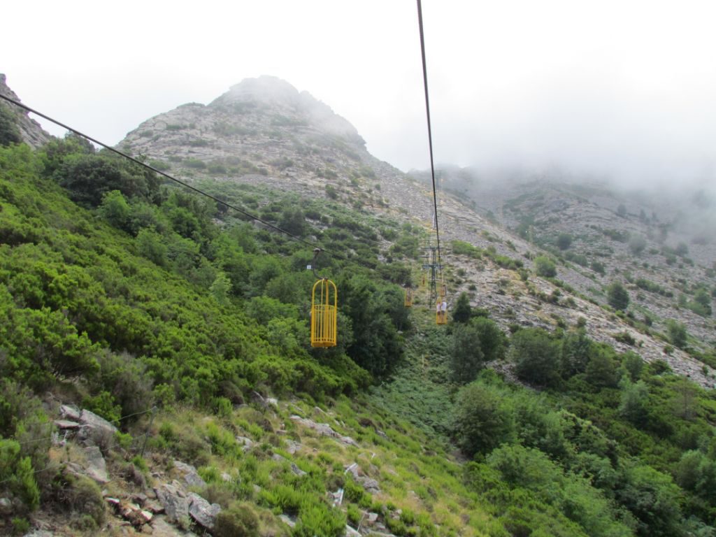 Wispy clouds snag on the peak